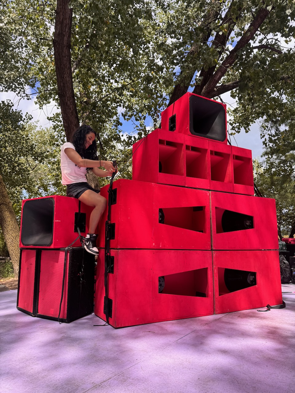 Close-up of hot‑pink speaker stack